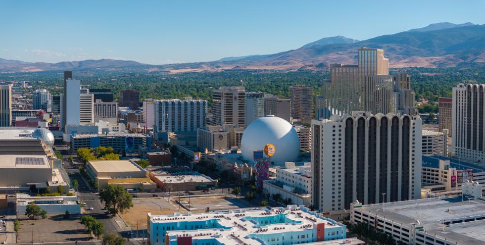 Downtown Reno from the air, with the Sierra foothills behind