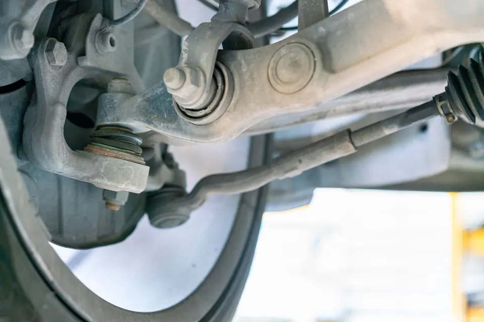 Car underside view, ball joint and control arm