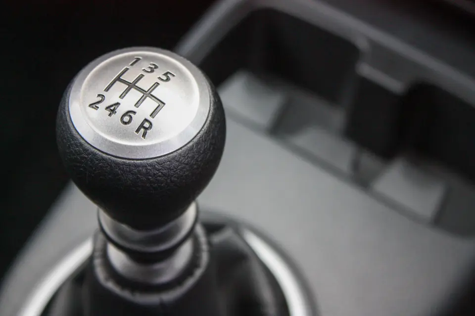A six-speed manual gear shifter, close up