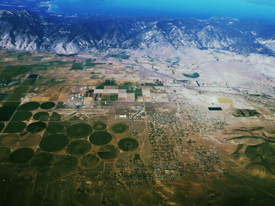 Minden and Gardnerville from the air, with farm fields and the Sierra