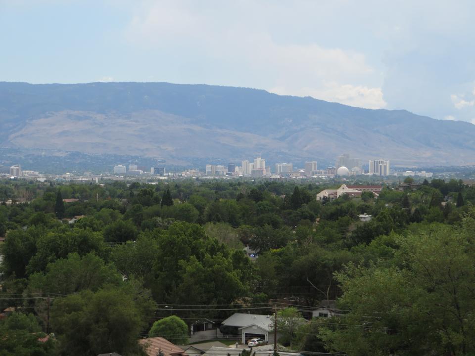 Reno's skyline seen from Sparks over the trees