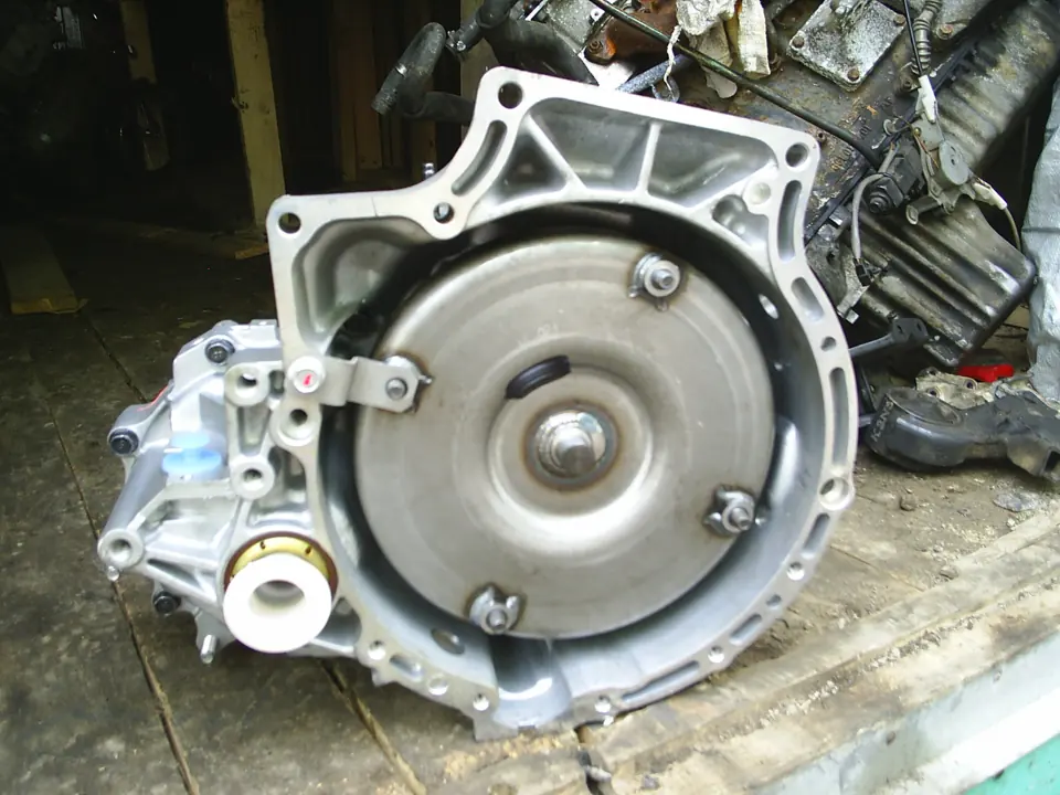 A torque converter mounted on an automatic transmission