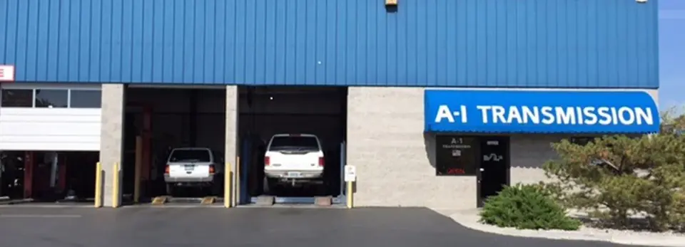 A-1 Transmission storefront on East Grove Street in Reno with the blue A-1 TRANSMISSION sign and open service bays